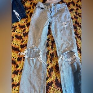 BDG jeans from urban outfitters. They’re boot cut at the bottom.